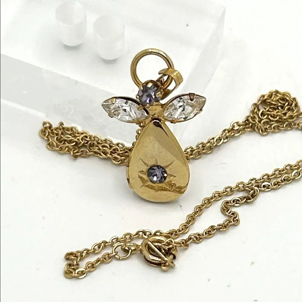 Vintage gold tone angel pendant locket birthstone necklace - purple rhinestone